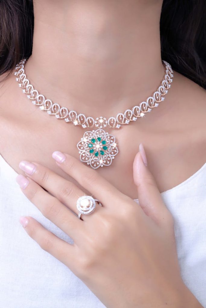 Close-up of a woman's hand with diamond jewelry, showcasing elegance and luxury of one and only