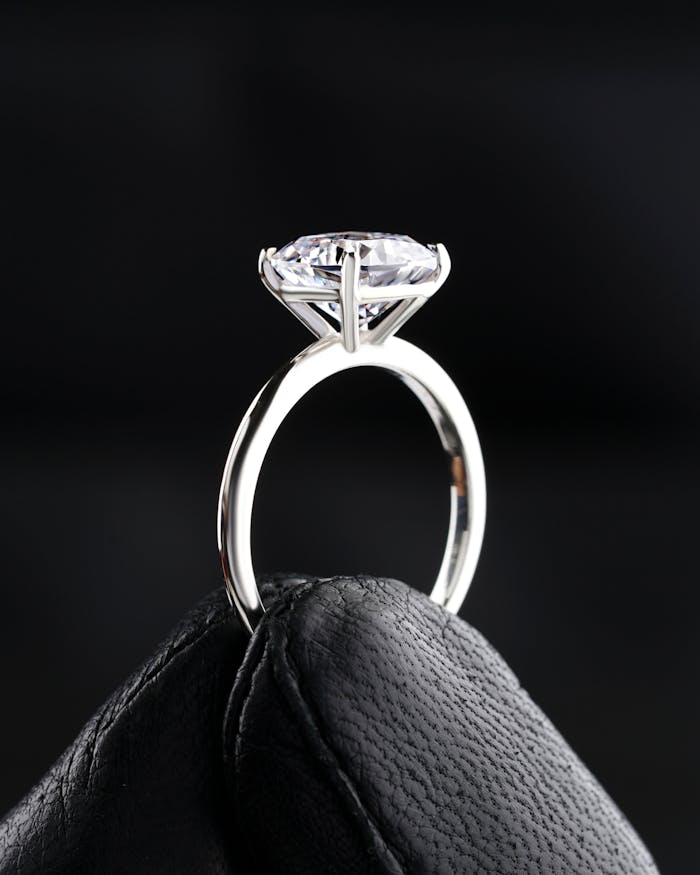 A close-up shot of a diamond ring exuding elegance and luxury, perfect for engagement themes.